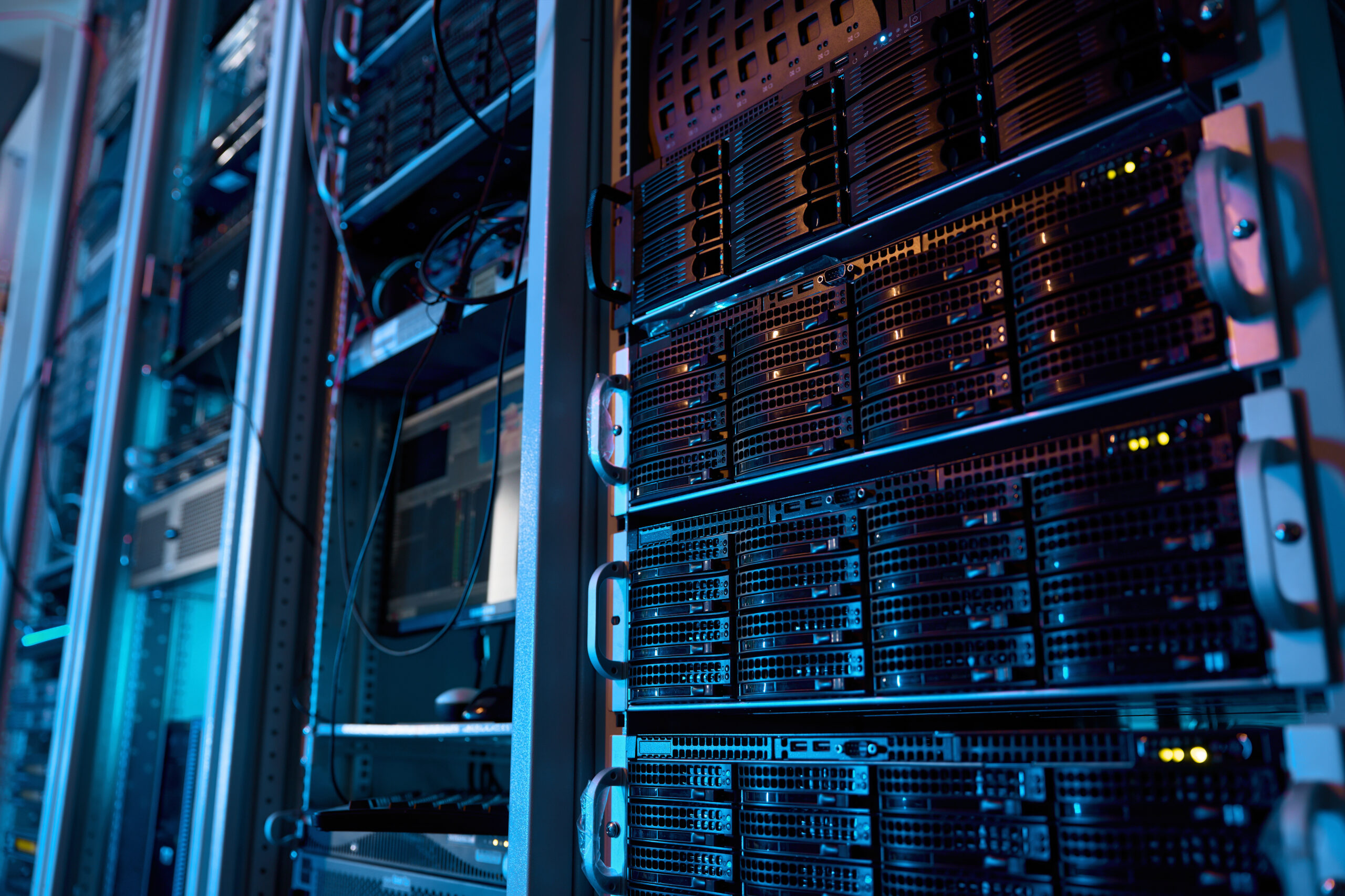 Server rack with supercomputer hardware in big data center inside closeup